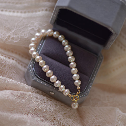 14K Gold Natural Pearl Bracelet.